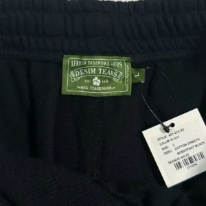 Denim Tears Cotton Wreath sweatpants black cotton material size large with branded label and tag