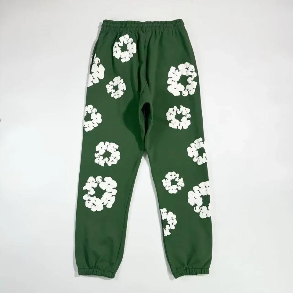 Repsgoat sweatpants green cotton with white circular floral pattern elastic waistband and cuffs