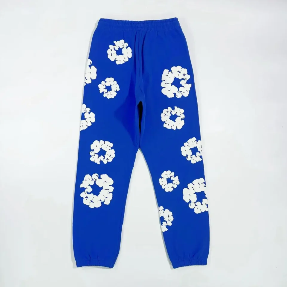No brand visible blue sweatpants with white floral circle patterns cotton material