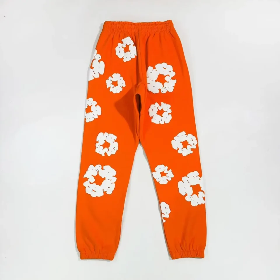 RepsGoat sweatpants orange with white floral patterns cotton elastic waist and cuffs