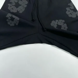 Cactus Plant Flea Market cropped hoodie black cotton blend with abstract floral print and drawstring hood