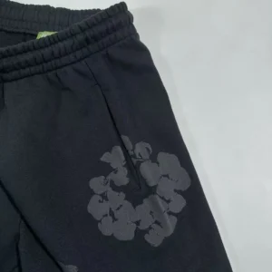 Nike sweatpants black cotton blend with subtle floral print and elastic waistband