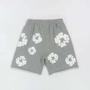 Grey cotton shorts featuring white floral designs, part of the Denim Tears Main Line Hemp collection, showcased for purchase at $59.00.