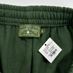 Denim Tears Cotton Wreath green shorts medium size textured fabric with elastic waistband