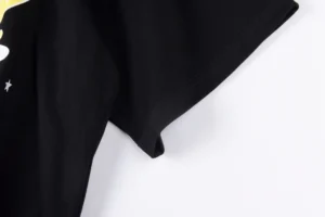 Black t-shirt sleeve featuring graphic design elements, representing the Young Thug Sder Wo product from RepsGoat, showcasing casual style and quality.