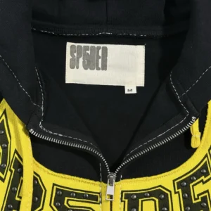 Sp5der TF Black and Yellow Riveted Zipper Shirt 08 collar and logo detail, showcasing high-quality fabric and craftsmanship.