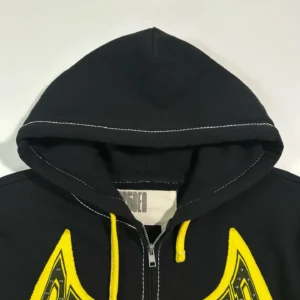 Sp5der TF Black and Yellow Riveted Zipper Shirt 08 showcasing black fabric with yellow accents, featuring a hood and zipper detail, emphasizing high-quality design for luxury replica apparel.