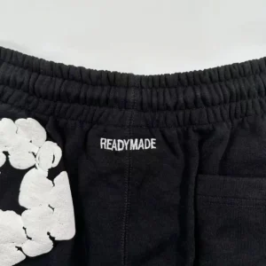 Readymade sweatpants black cotton with elastic waistband and white printed cloud design detail