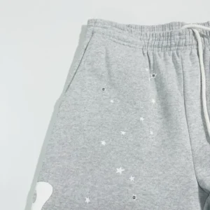 Sder Light Grey Beluga Sweatpants featuring star embellishments and side pockets, highlighting luxury replica clothing design by SP5DER.