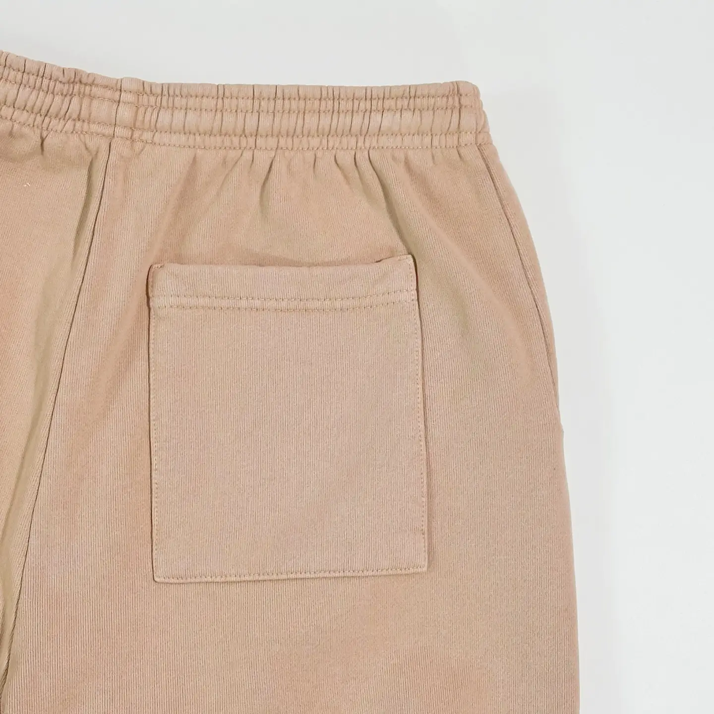 Sder Camel Beluga Sweatpants 05 featuring elastic waistband and back pocket detail, showcasing fabric quality and design.
