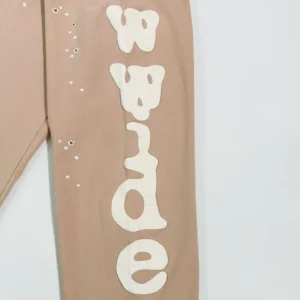 Sder Camel Beluga Sweatpants 05 featuring distinctive white text design on leg, highlighting unique style for affordable replica apparel.