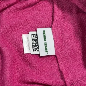 Denim Tears sweatshirt pink terry cloth cotton blend made in Portugal with brand logo tag
