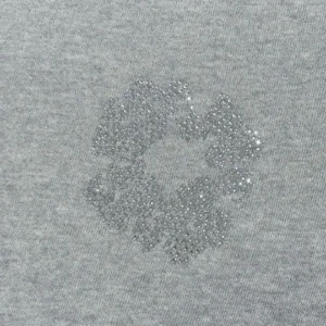 Grey cotton fabric featuring a diamond flower design, representing the Denim Tears Grey Water Diamond Cotton Flower product.
