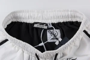 Hellstar Studios Path to Paradise Shorts featuring elastic waistband and brand logo tag, emphasizing casual sportswear design.