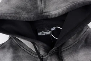 Hellstar hoodie featuring a black and gray design with a visible logo inside the hood.