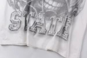 Stussy graphic sweatshirt white cotton fabric with gray airbrushed logo print and ribbed hem