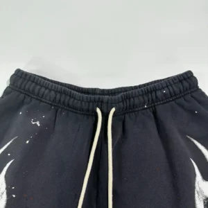 Hellstar Black Halloween shorts featuring a drawstring waistband and white graphic design elements on black fabric.