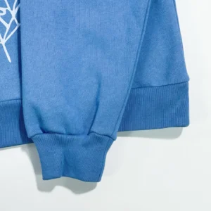 This image shows a close-up of blue fabric cuffs, but it does not match any of the specified product types or rules for watches, sneakers, bags, or accessories on repsgoat.com. Please provide an image of one of the allowed product categories for SEO-optimized alt text.