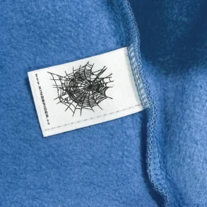 Kingspider fleece sweater light blue soft fabric with spider web logo tag