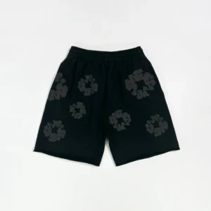 No brand visible black shorts with dark floral print and elastic waistband, cotton material