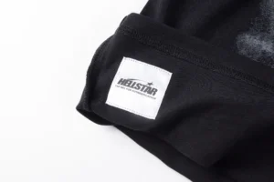 Helistar Graphic Tee black cotton shirt with white brand label and authenticity NFC tag