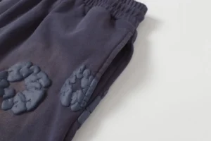 RepsGoat sweatpants navy blue fleece fabric with textured padded logo detailing and elastic waistband