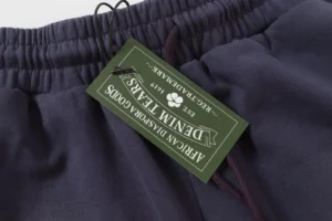 African Diaspora Goods denim tears navy cotton elastic waist sweatpants with drawstring