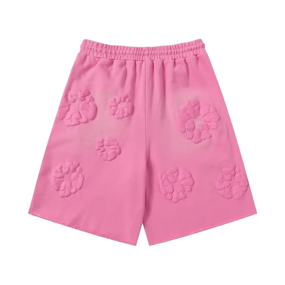 No brand or product type provided for this pink shorts with embossed flower pattern in image. Please provide brand and product type for SEO alt text.