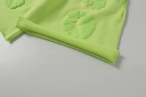 Chanel knit scarf lime green wool fabric with embossed floral pattern accessory