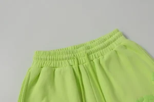 Nike Sportswear Club Fleece neon yellow cotton blend sweatpants with elastic waistband and pockets