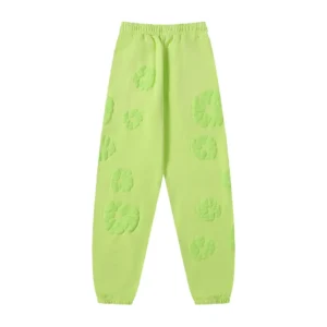 Denim Tears new cotton flower pants in fluorescent green with foam flower embellishments, showcasing a relaxed fit and elastic waistband, available for purchase on RepsGoat.