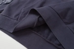 RepsGoat hoodie navy blue cotton blend fabric close-up of sleeve and pocket stitching