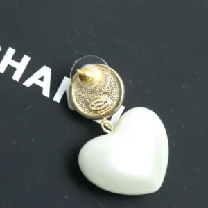 Chanel heart-shaped stud earring white resin gold-tone metal backing accessory