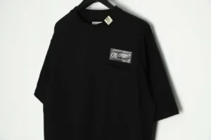 M. Mihara T-shirt black cotton short sleeve with branded chest pocket logo patch