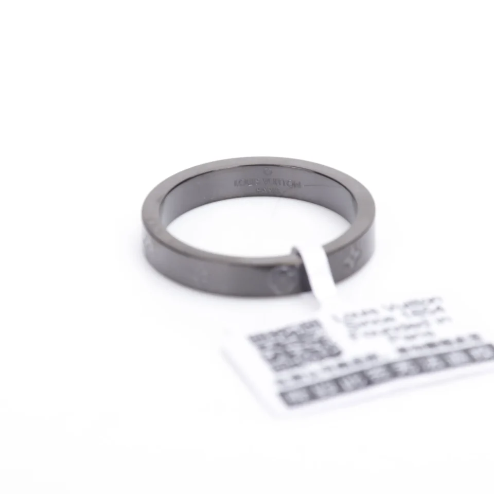 Louis Vuitton ring black metal band with engraved logo and symbols luxury accessory