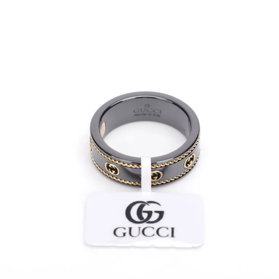 Gucci ring black metal with gold-tone logo detail and twisted rope trim accessory