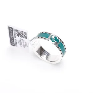 Gucci 925 Sterling Silver Double G Ring with turquoise accents and price tag, showcasing affordable luxury jewelry replica.