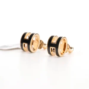 Hermès Love Magic Square Enamel Earrings featuring gold and black enamel design, showcasing fine craftsmanship and elegant style for fashion accessories.