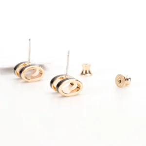 Hermès Love Magic Square Enamel Earrings featuring polished gold and black enamel design, with pure silver ear needles and small waist earplugs.