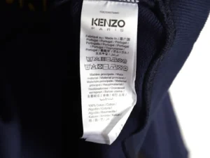 Kenzo clothing tag navy cotton fabric made in Portugal detailed care instructions label