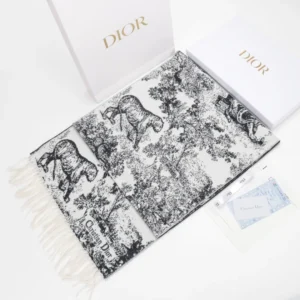 Dior Sauvage Zoo Tassel Long Wool Scarf with intricate animal and landscape patterns, displayed with packaging, emphasizing luxury fashion accessory details.
