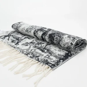 Dior Sauvage Zoo Tassel Long Wool Scarf featuring a black and white printed design with fringed edges, emphasizing luxury fashion accessory details and craftsmanship.