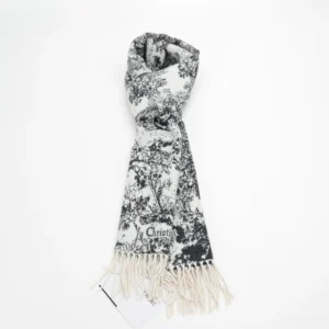 Dior Sauvage Zoo Tassel Long Wool Scarf in black and white with intricate patterns and fringe, showcasing luxury fashion accessory design.