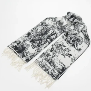 Dior Sauvage Zoo Tassel Long Wool Scarf in black and white featuring intricate printed patterns and fringed edges, showcasing luxury fashion design elements.