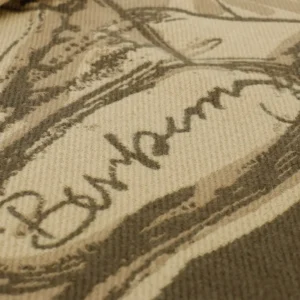 Supreme sweater beige brown cotton print design close-up texture fabric detail