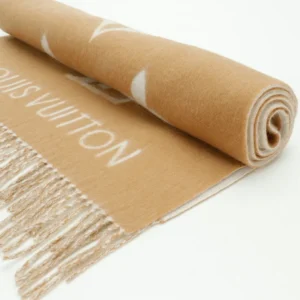Louis Vuitton Printed Cashmere Fringe Scarf rolled up, showcasing the brand logo and soft fabric texture, featured in an e-commerce listing for high-end fashion accessories.