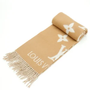 Louis Vuitton Printed Cashmere Fringe Scarf in beige with white logo and floral pattern, showcasing luxury design and high-quality fabric.