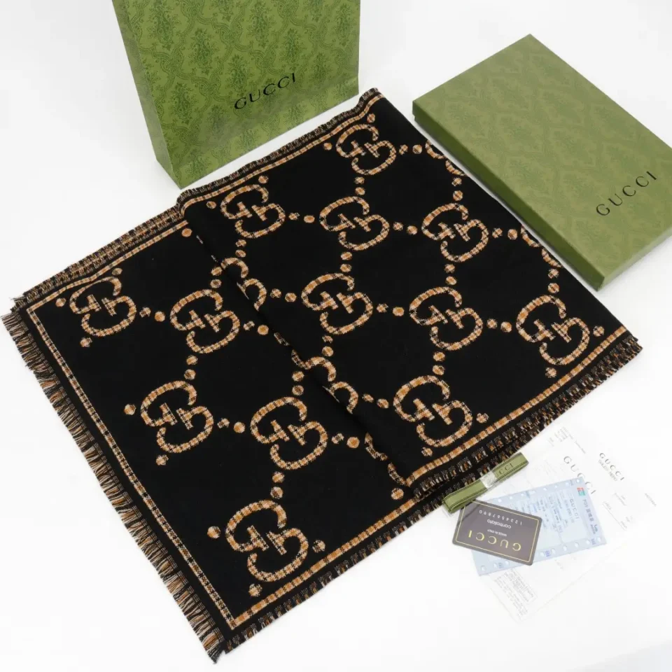 Gucci GG wool scarf black brown logo pattern fringed edges luxury winter accessory