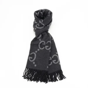 Gucci Big GG Double-Sided Jacquard Long Scarf in black and gray with fringe detailing, showcasing luxury designer branding.