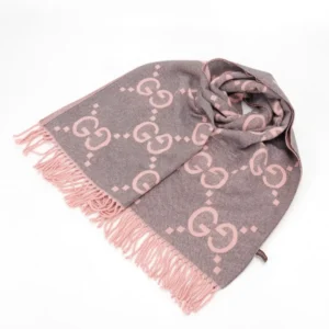 Gucci Big GG Double-Sided Jacquard Long Scarf in pink and gray with fringe, featured as a high-end winter accessory for purchase.